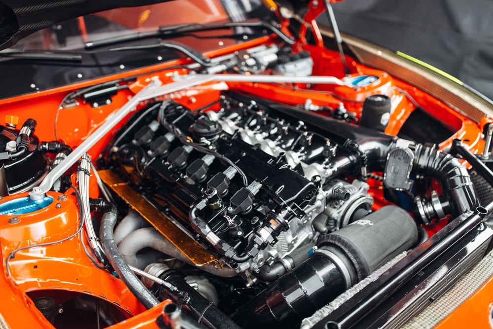 Open,Hood,And,Engine,Bay,Of,Racing,Car